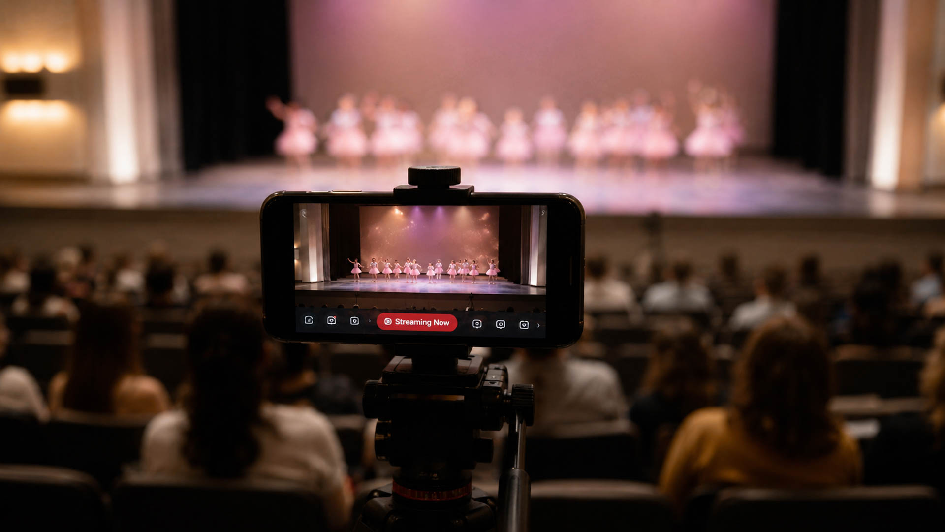 A dance recital being filmed